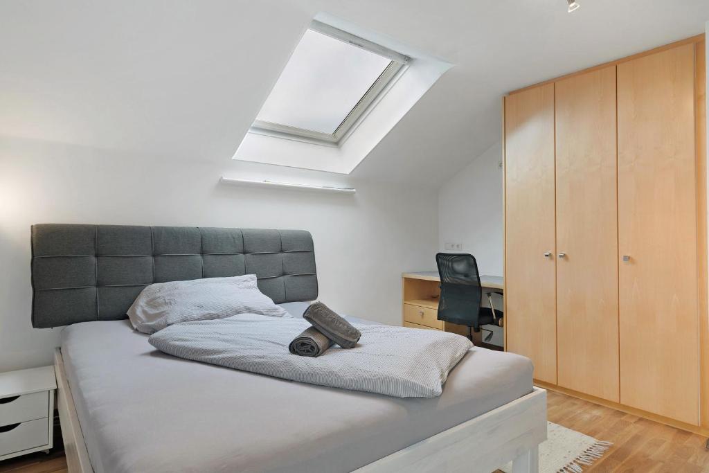 Postel nebo postele na pokoji v ubytování Ferienwohnung Rheintal Hard