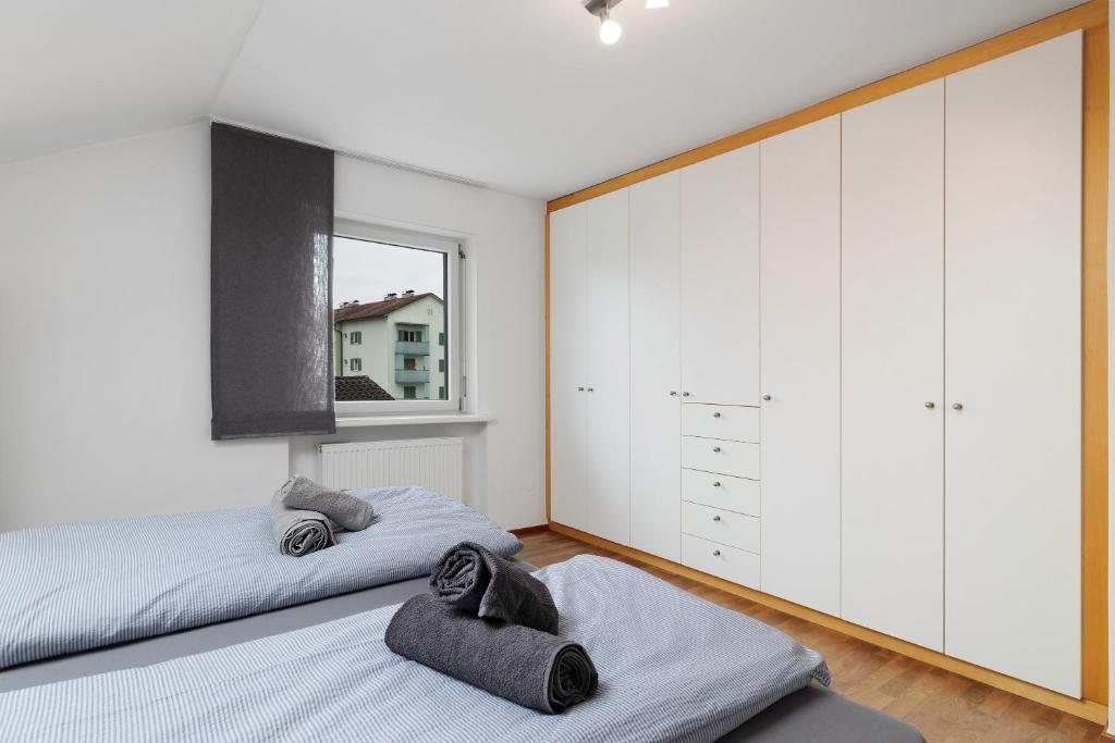 Postel nebo postele na pokoji v ubytování Ferienwohnung Rheintal Hard
