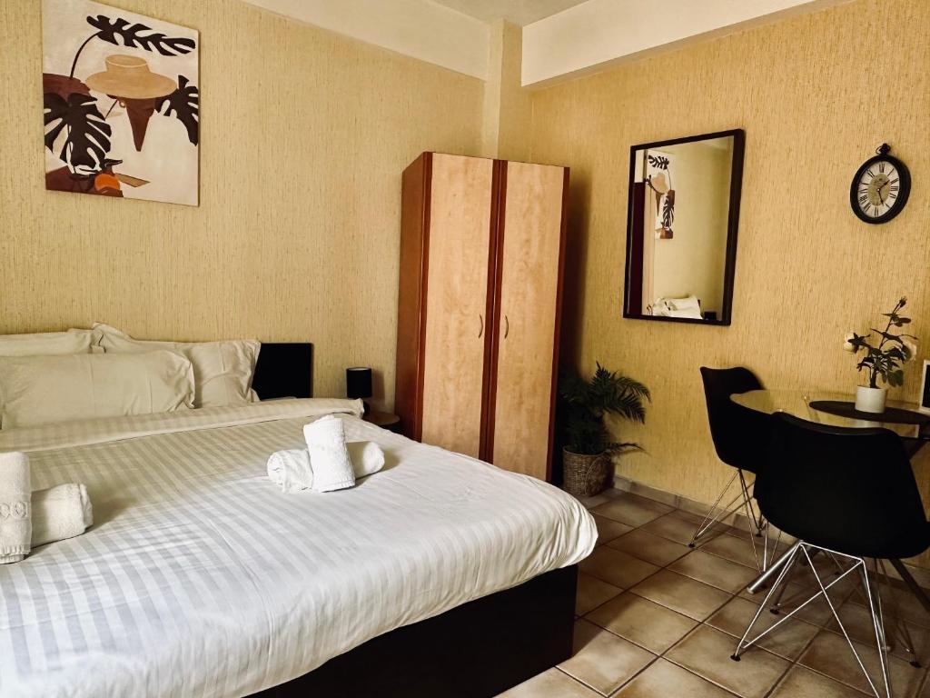 Posteľ alebo postele v izbe v ubytovaní Cozy Apartments Mc Queen