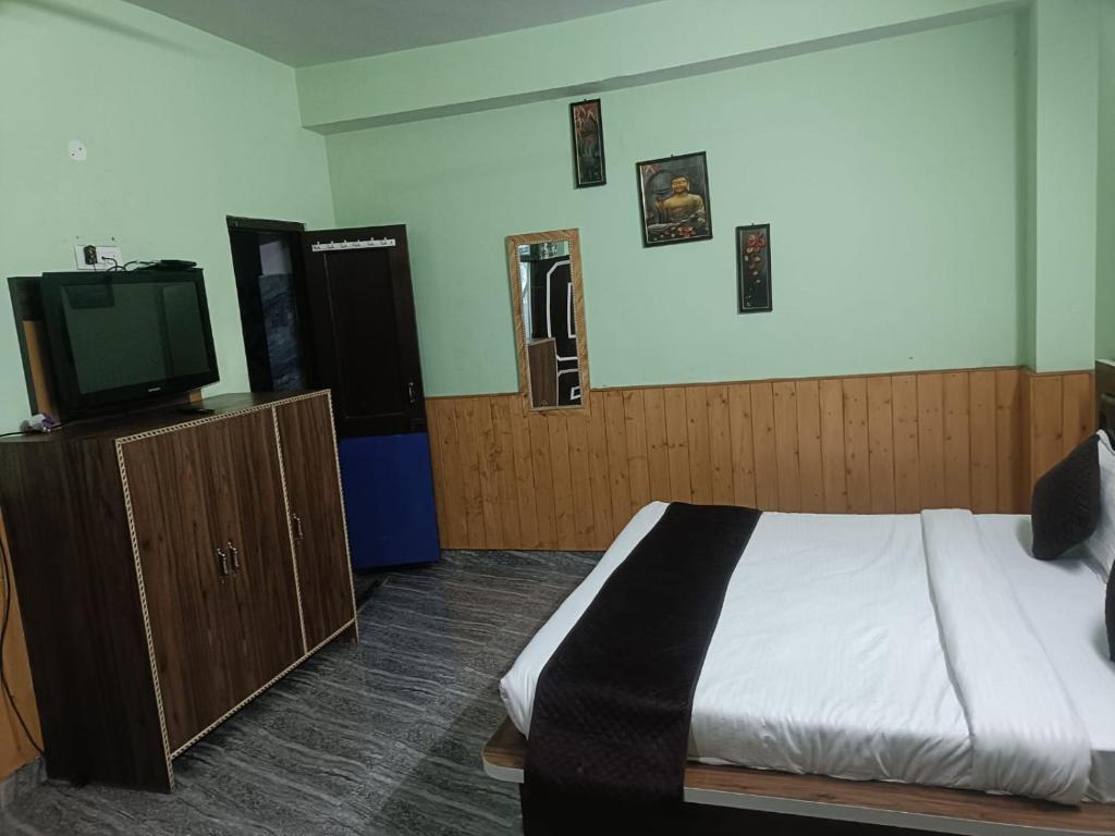 Postel nebo postele na pokoji v ubytování Hotel River View