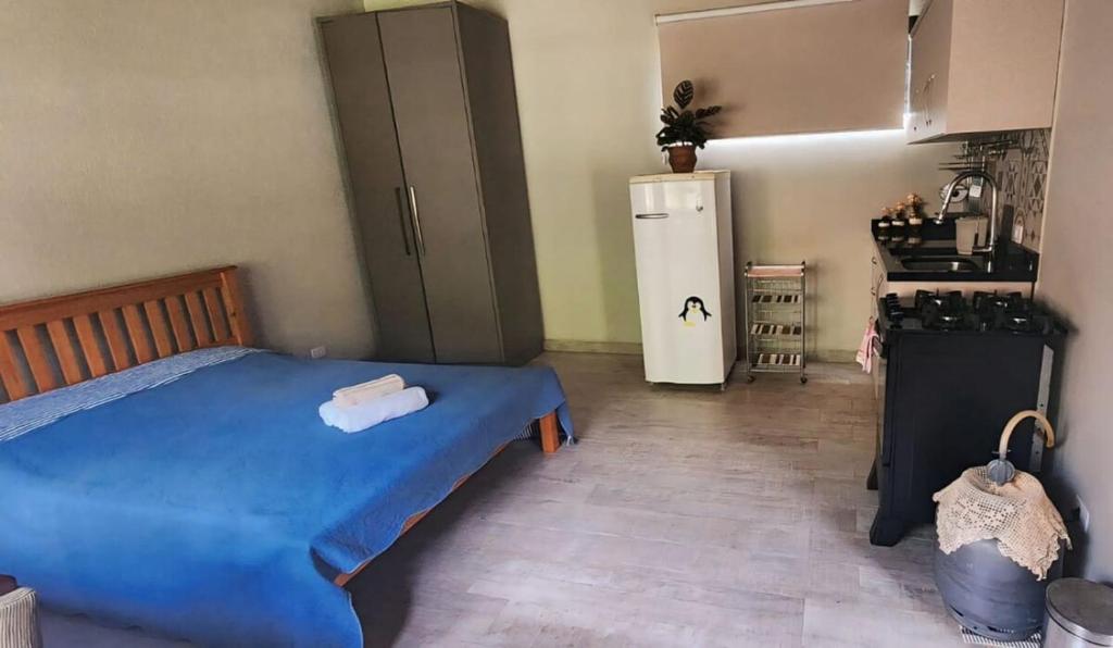 Kuchyň nebo kuchyňský kout v ubytování Suíte Parque Barigui