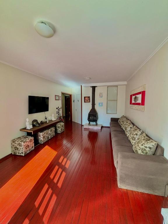 TV a/nebo společenská místnost v ubytování Casa do Rogerio Hostel - Unidade Shopping