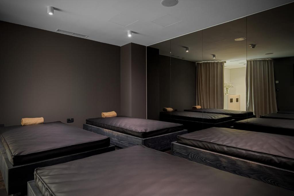 Postel nebo postele na pokoji v ubytování Boutique Hotel Noemia