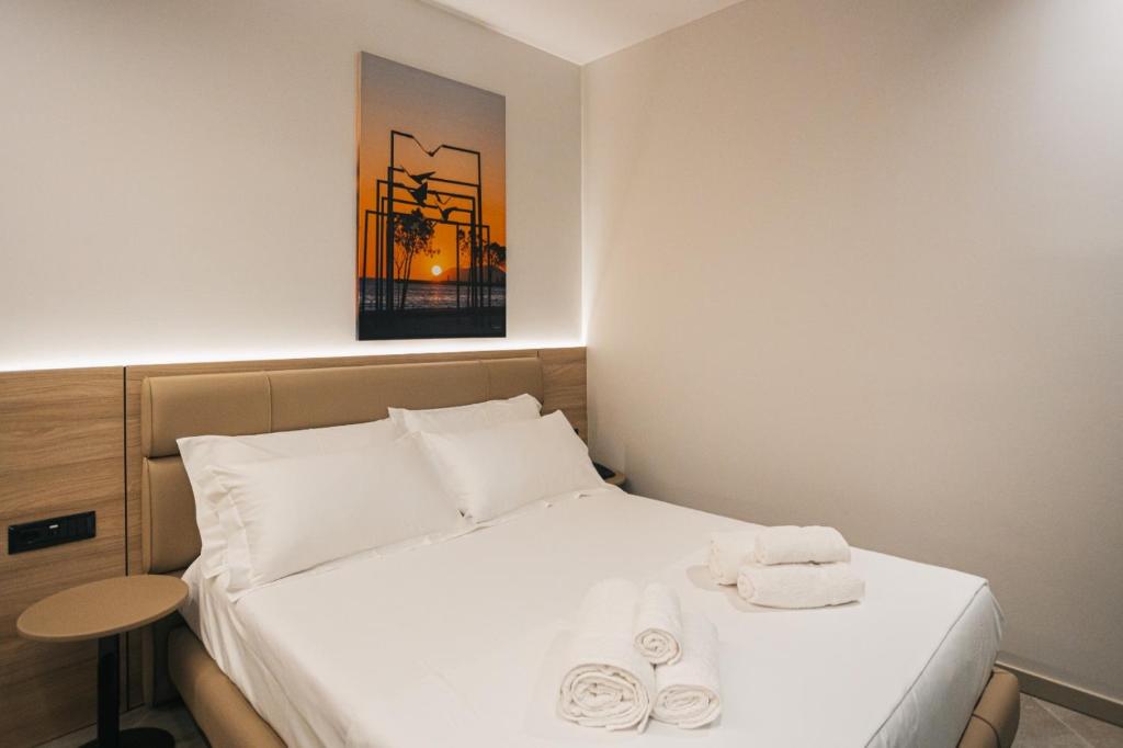 Postel nebo postele na pokoji v ubytování Hotel Flamingo 1