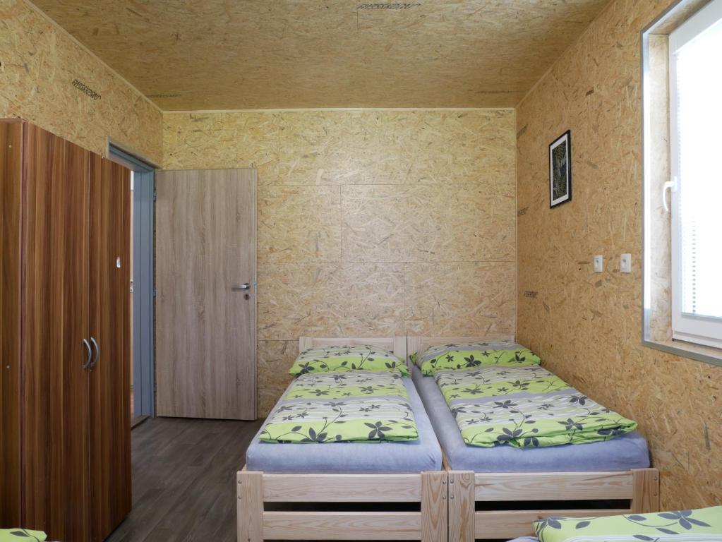 Postel nebo postele na pokoji v ubytování Camping Rožnov