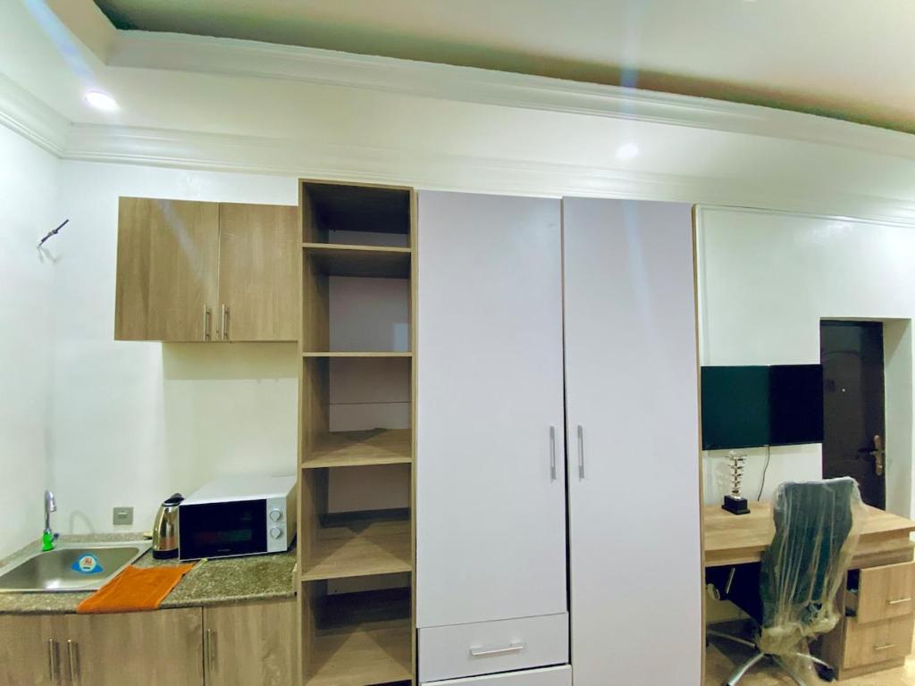 Kuchyň nebo kuchyňský kout v ubytování Studio Apartment - Lekki Lagos