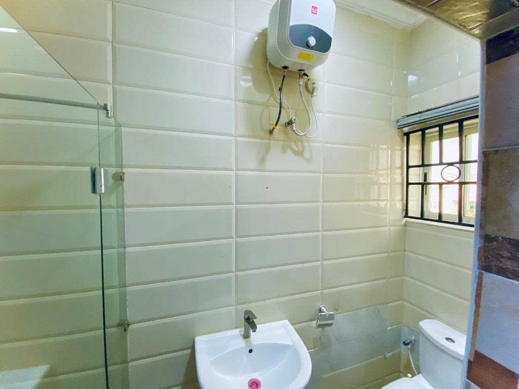 Koupelna v ubytování Studio Apartment - Lekki Lagos