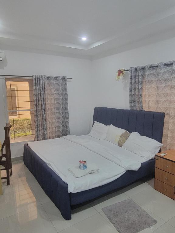 Postel nebo postele na pokoji v ubytování Amazing Suites Bedroom Apartments, Lekki