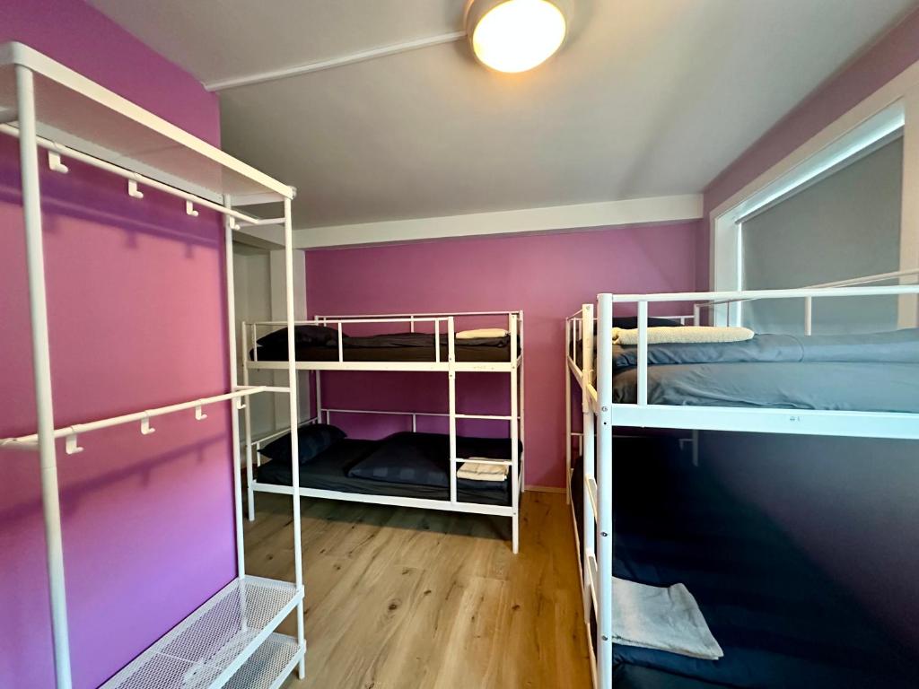 Postel nebo postele na pokoji v ubytování Hostel Fjordur