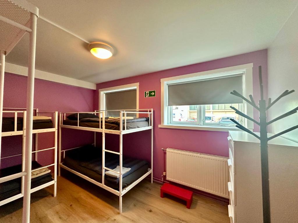 Postel nebo postele na pokoji v ubytování Hostel Fjordur