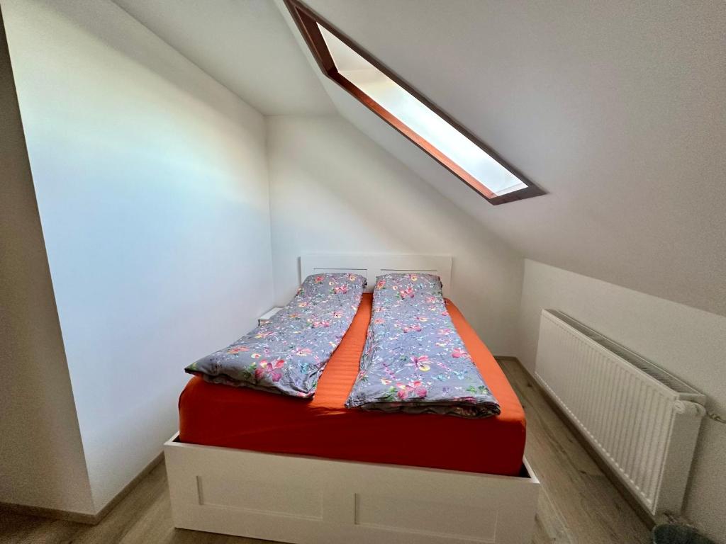 Postel nebo postele na pokoji v ubytování Hostel Fjordur
