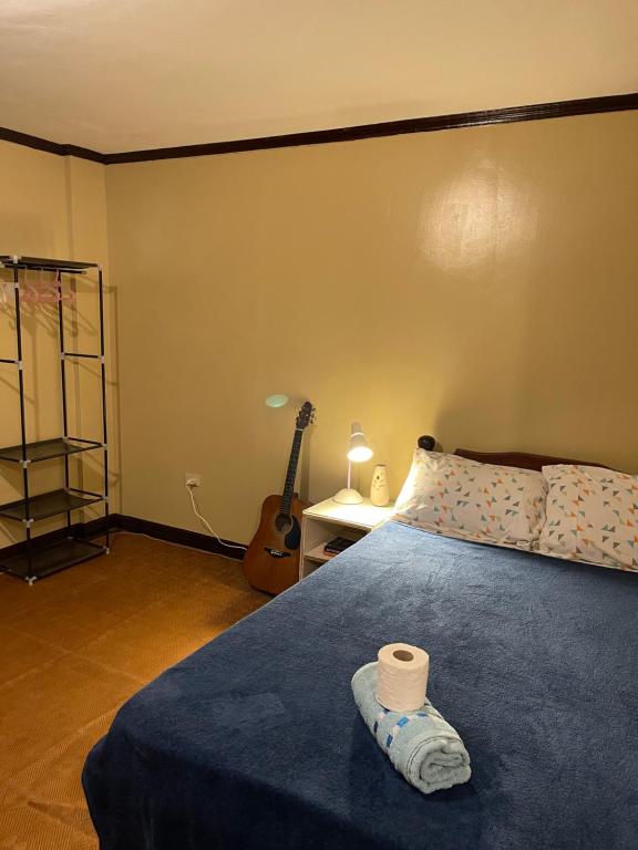 Ένα ή περισσότερα κρεβάτια σε δωμάτιο στο Seascape at Top Sea Can Siargao