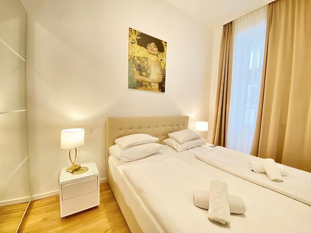 Posteľ alebo postele v izbe v ubytovaní Steiner Residences Vienna Taborstrasse