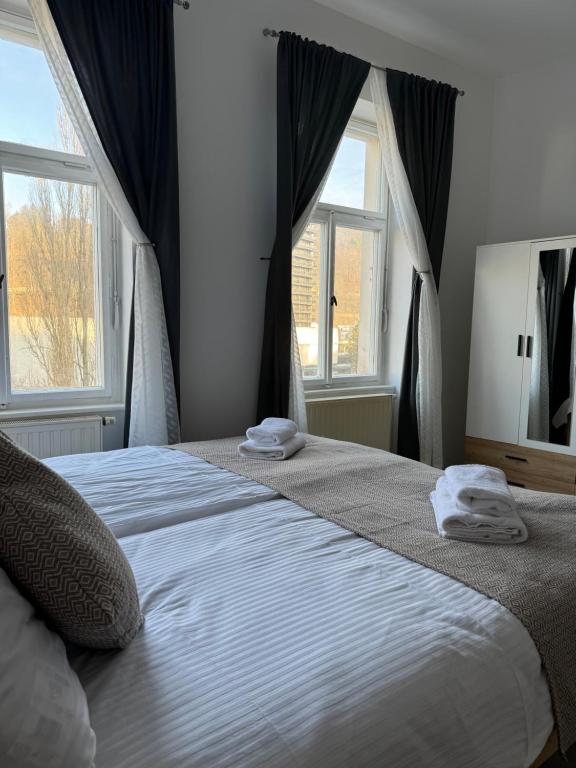 Voodi või voodid majutusasutuse Magnet Apartment toas