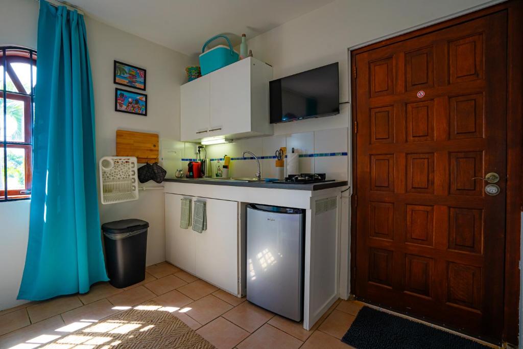 Kuchyň nebo kuchyňský kout v ubytování Casa Leonore Studio