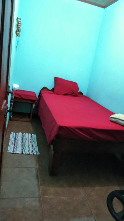 Кровать или кровати в номере Cabinas Mitchaelle's