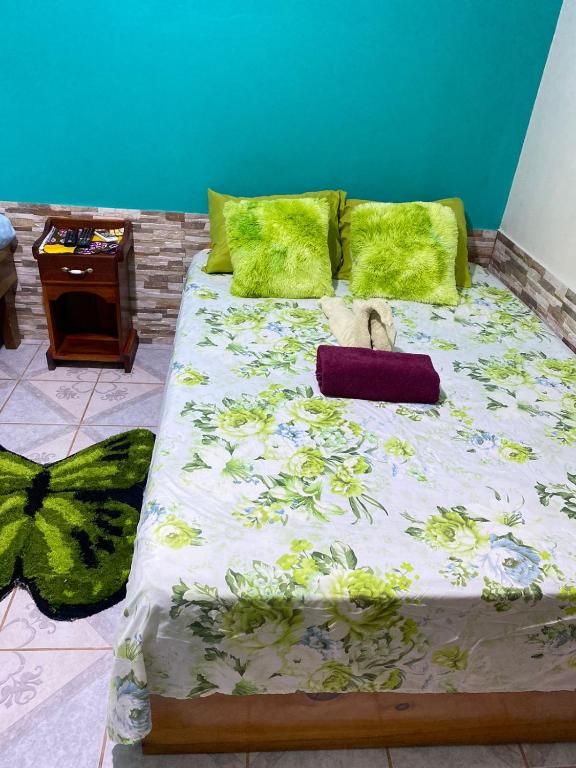 Кровать или кровати в номере Cabinas Mitchaelle's