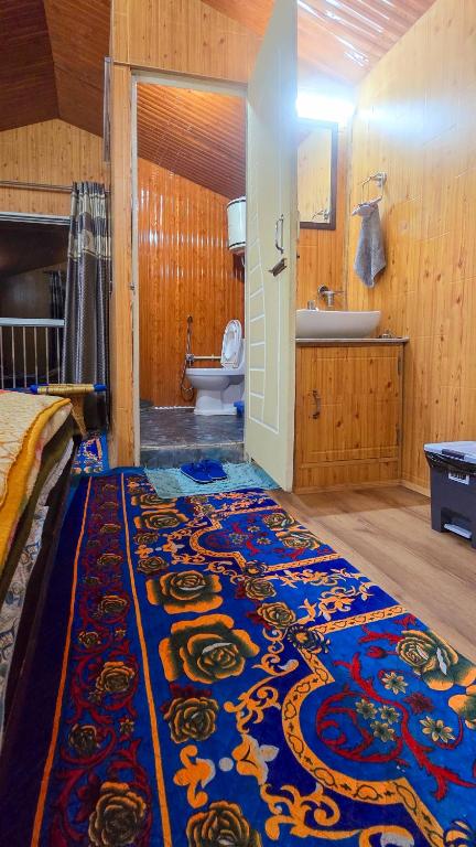 Postel nebo postele na pokoji v ubytování The City Escape Farmstay