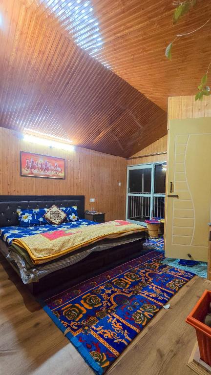 Postel nebo postele na pokoji v ubytování The City Escape Farmstay