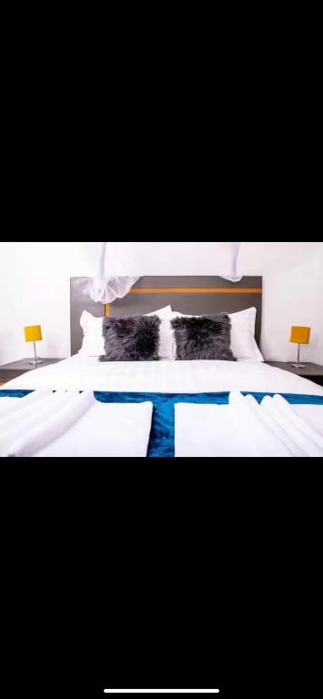 Postel nebo postele na pokoji v ubytování Bouje home