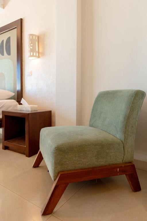 Uma área de estar em Hotel Kinich