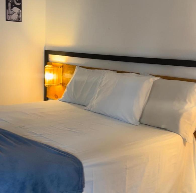 Postel nebo postele na pokoji v ubytování Hotel Fazenda Monte Cristo