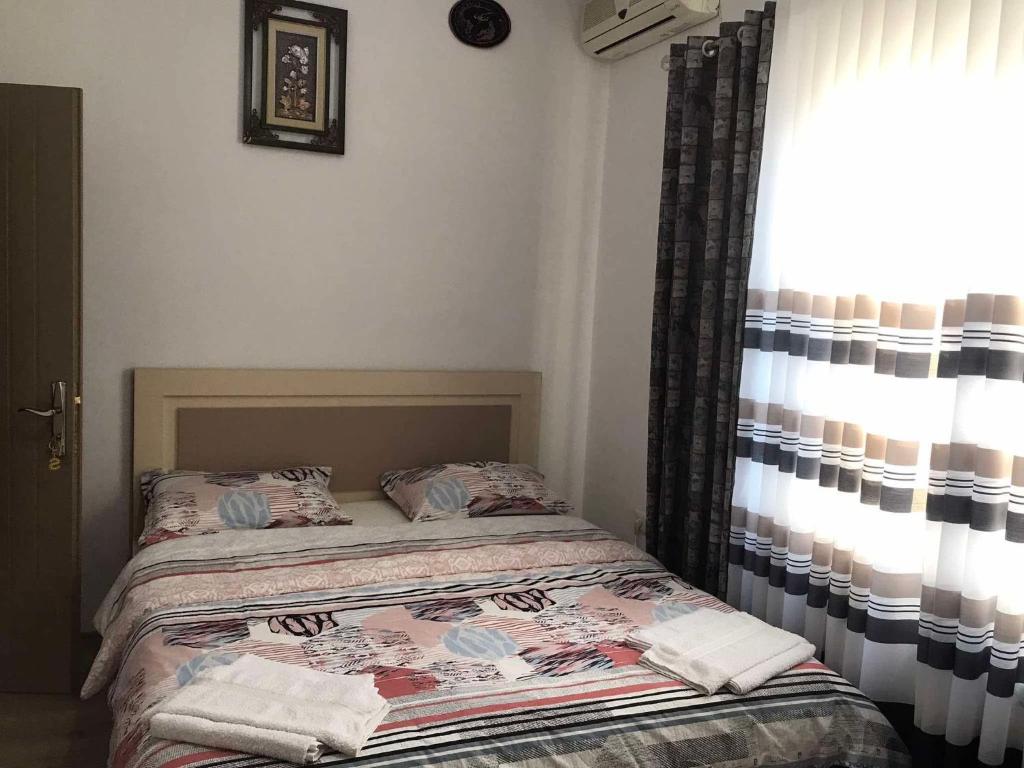 Postel nebo postele na pokoji v ubytování Villa Rejan