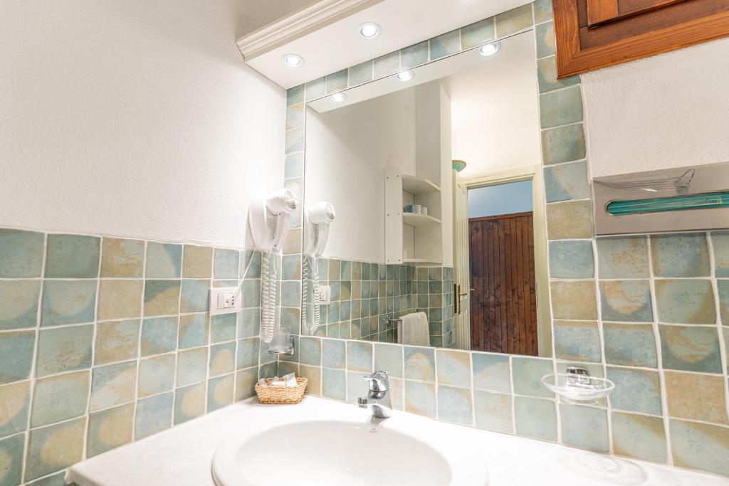 Koupelna v ubytování Hotel Villa Gemella