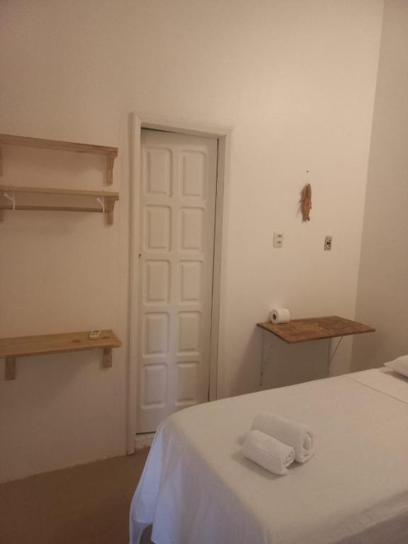 Postel nebo postele na pokoji v ubytování Vilare Pousada