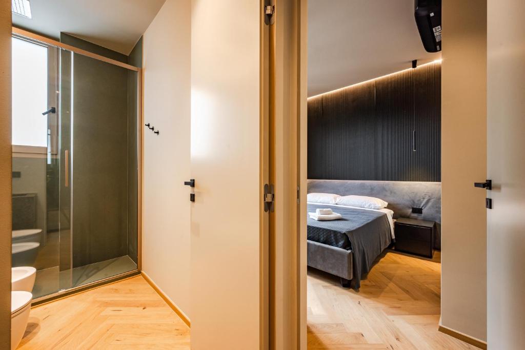 Letto o letti in una camera di Luxury Suite with View Steps from the Duomo