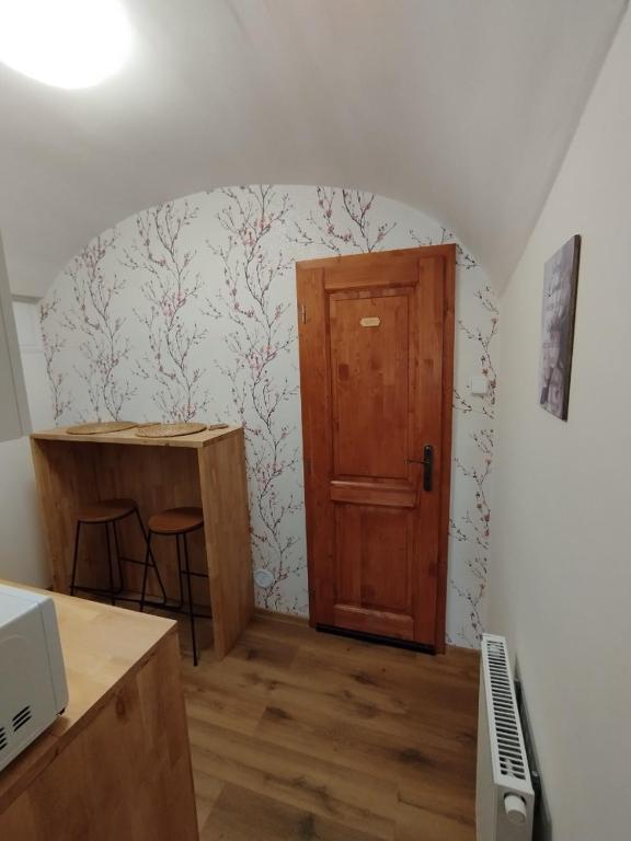 Kuchyň nebo kuchyňský kout v ubytování Apartmány Fany
