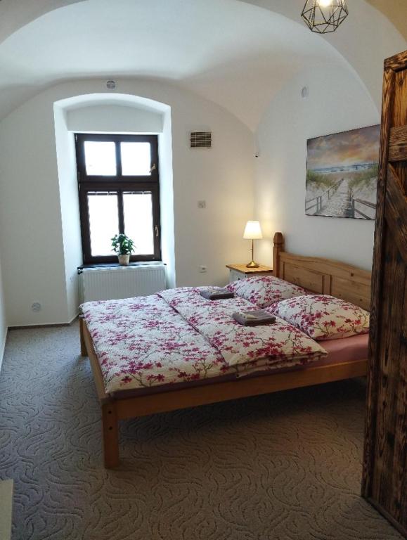 Postel nebo postele na pokoji v ubytování Apartmány Fany