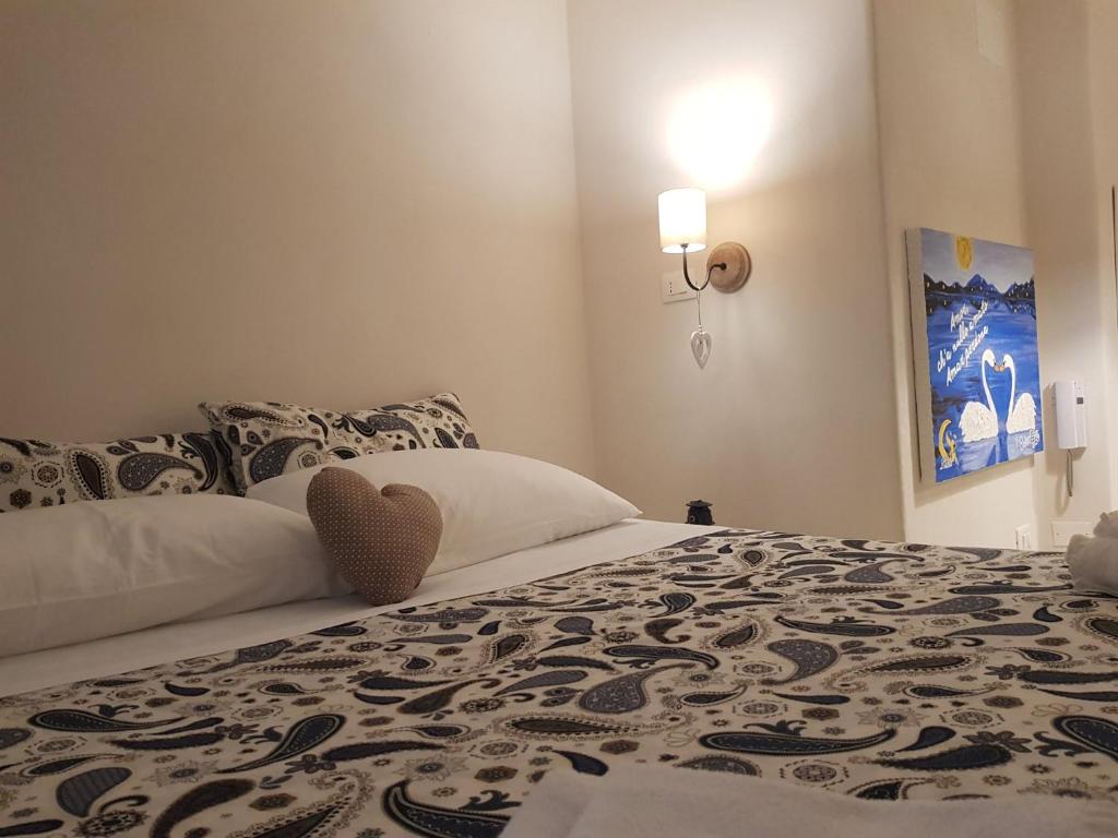Postel nebo postele na pokoji v ubytování Cieli di Dante