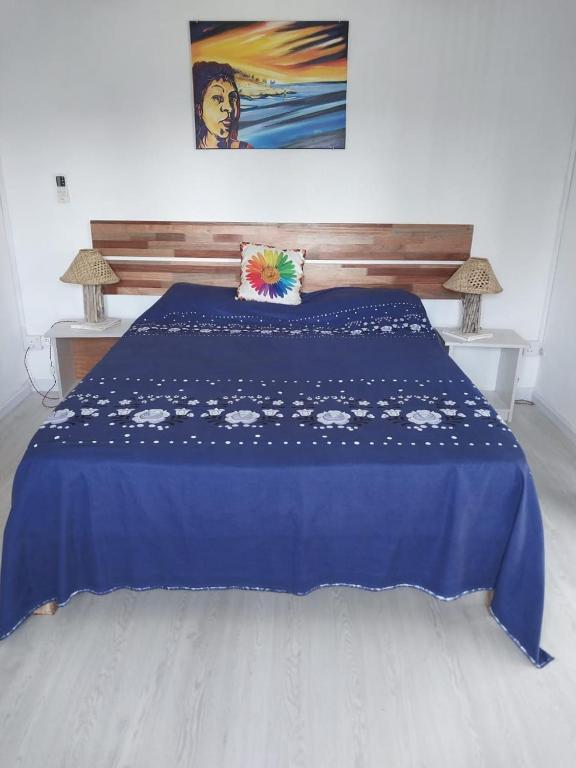 Postel nebo postele na pokoji v ubytování Poisson d'Or Guest House