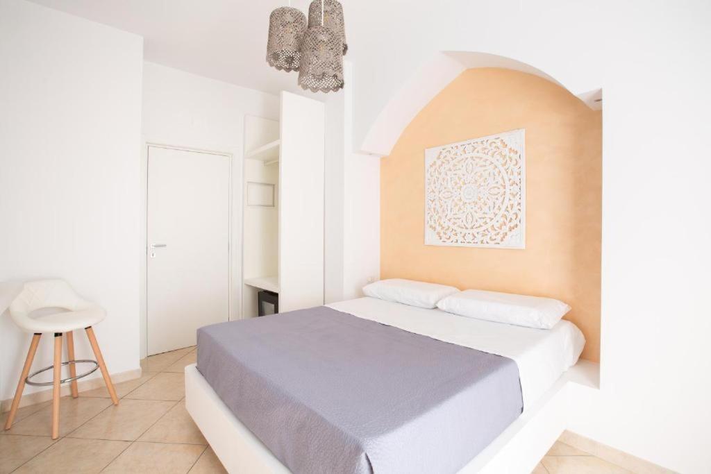 Postel nebo postele na pokoji v ubytování Le Dune B&B