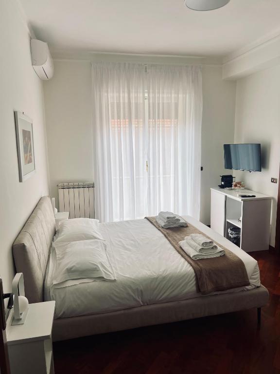 Postel nebo postele na pokoji v ubytování Montesanto 25