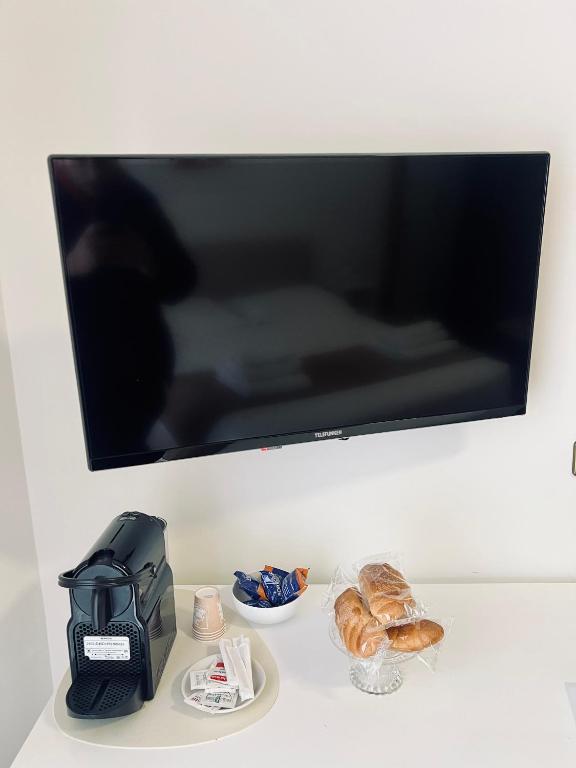 TV a/nebo společenská místnost v ubytování Montesanto 25