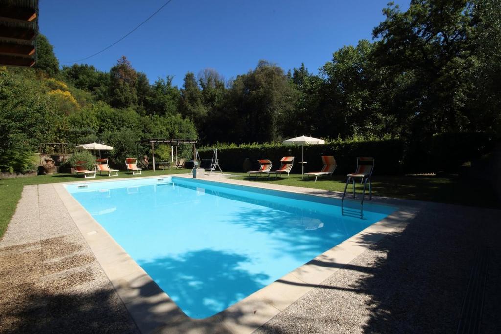 Bazén v ubytovaní Loretta - Private holiday apartment with shared pool alebo v jeho blízkosti
