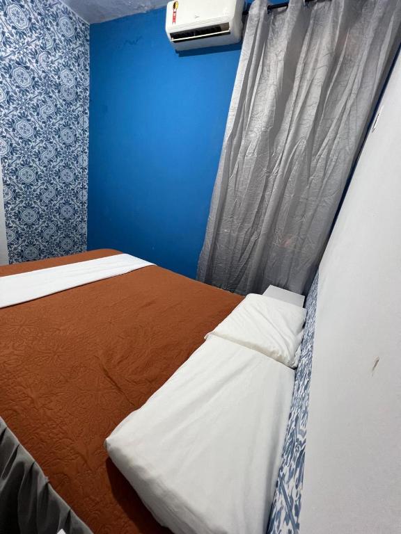 Postel nebo postele na pokoji v ubytování Calango Hostel