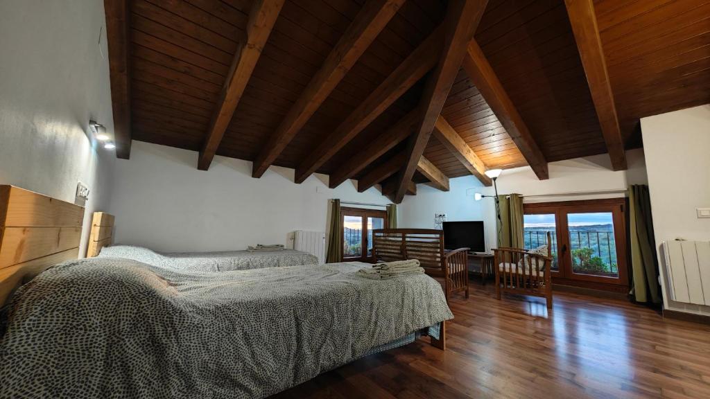 Postel nebo postele na pokoji v ubytování Apartamentos Rurales Rad Icarium