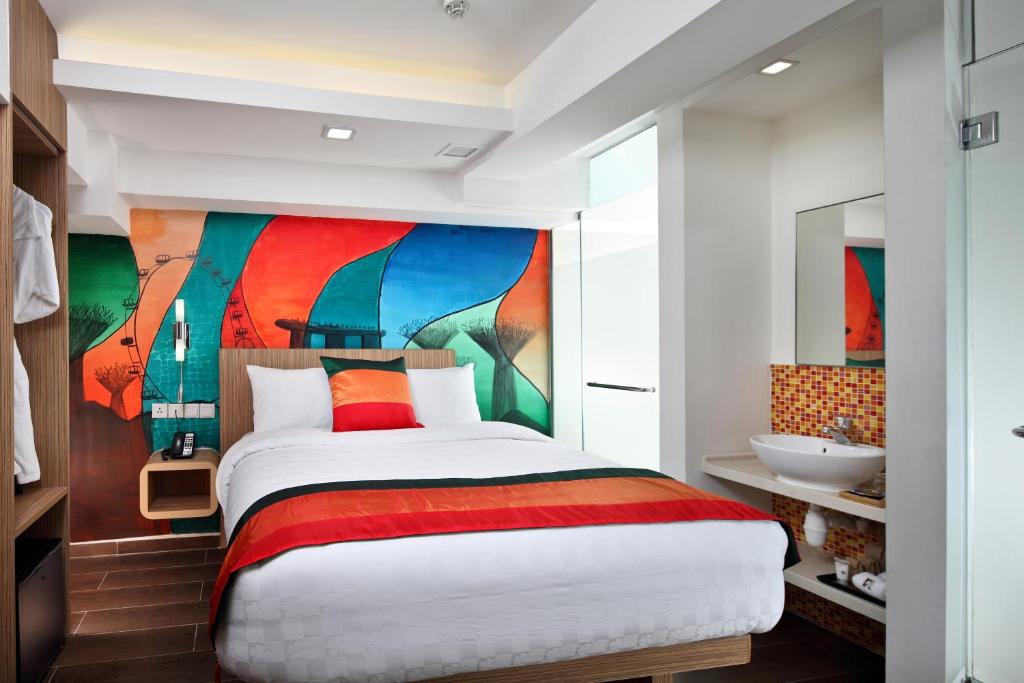 Кровать или кровати в номере Hotel Clover The Arts