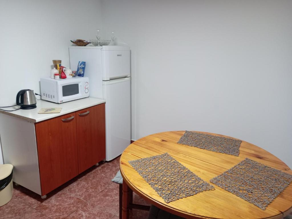 Kuchyň nebo kuchyňský kout v ubytování Stan na dan Kamenički park