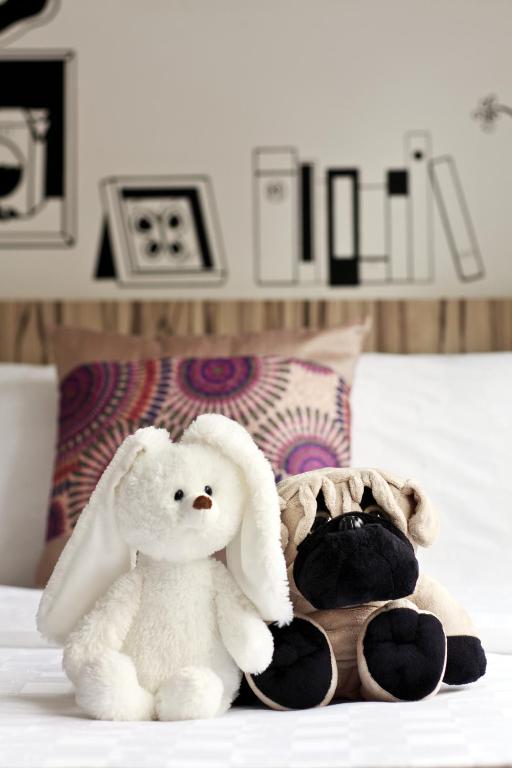 Кровать или кровати в номере Hotel Clover The Arts