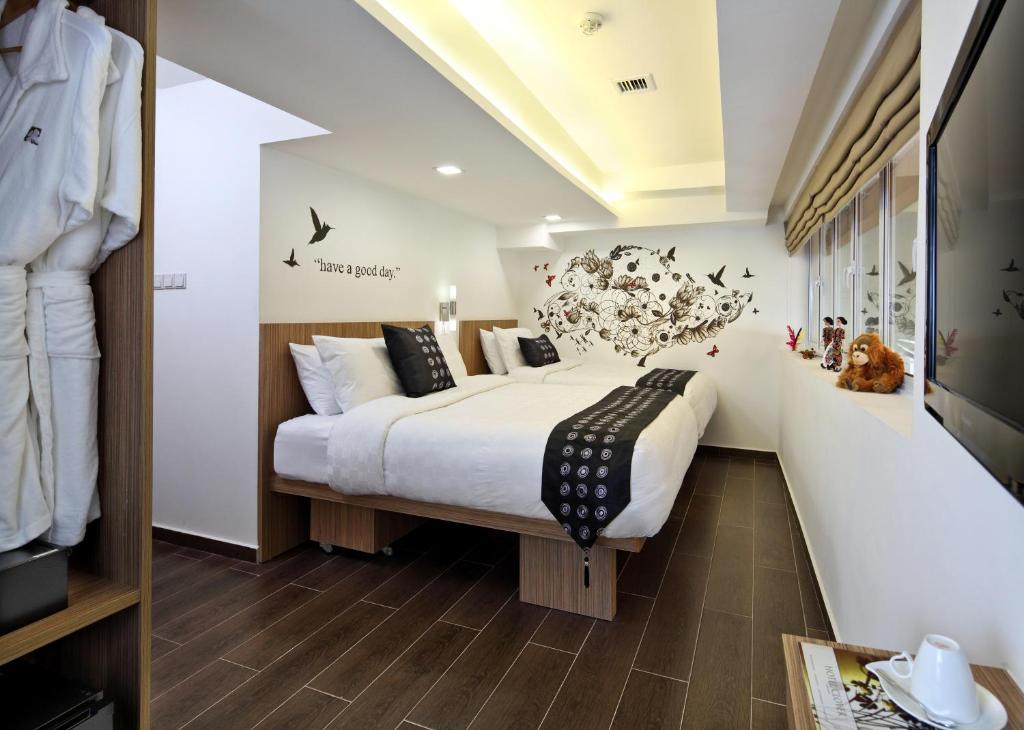 Кровать или кровати в номере Hotel Clover The Arts