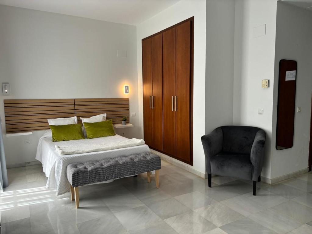 Postel nebo postele na pokoji v ubytování Hotel Lince
