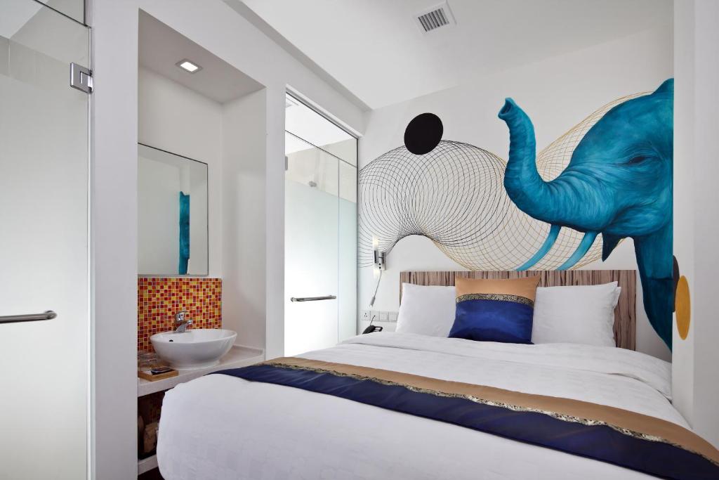 Кровать или кровати в номере Hotel Clover The Arts
