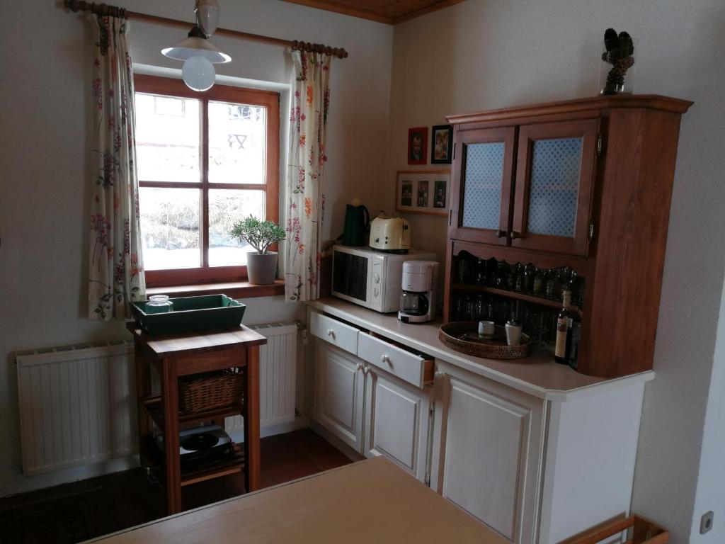 Kuchyň nebo kuchyňský kout v ubytování Chalet Dreibubenhaus.