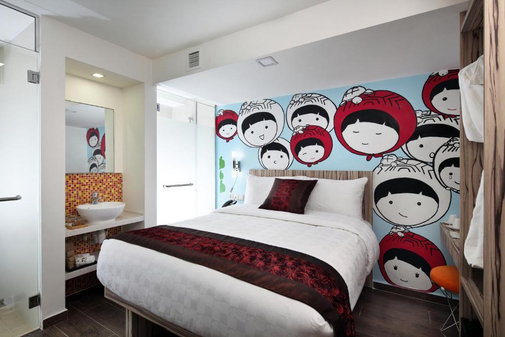 Кровать или кровати в номере Hotel Clover The Arts