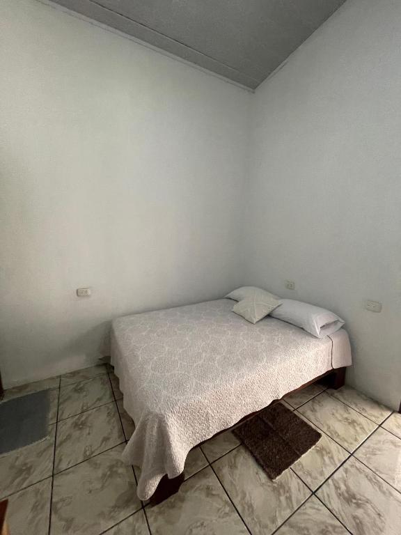 Postel nebo postele na pokoji v ubytování Casa Los Delfines