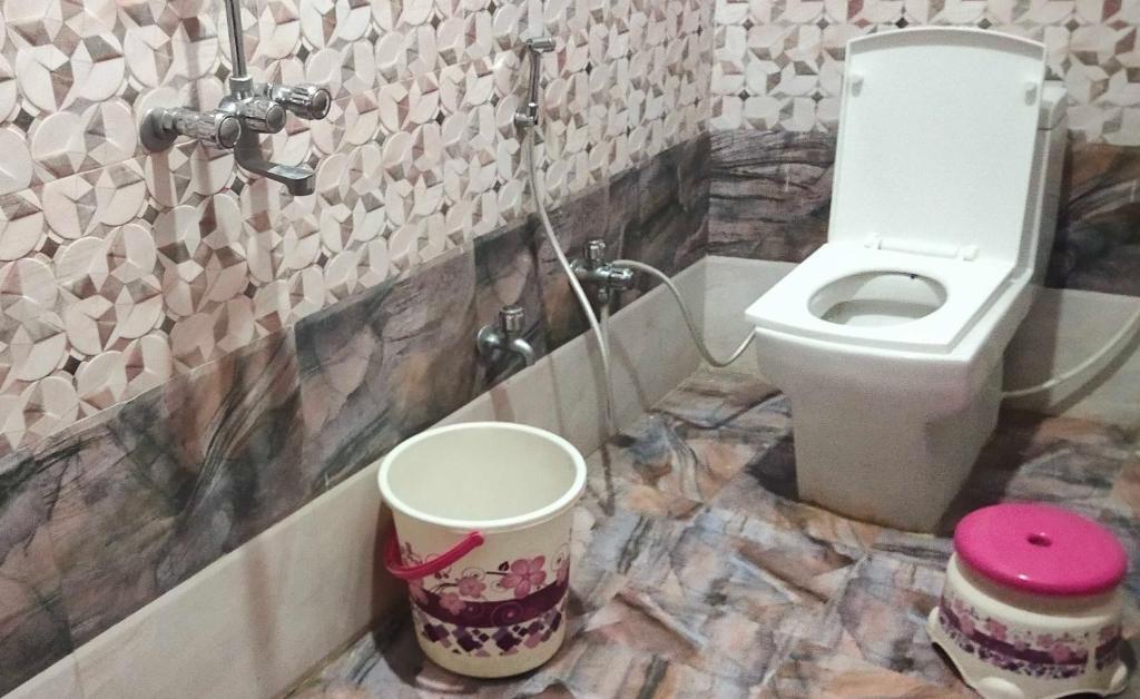 Et badeværelse på Hotel O Home Shree Narayana Homestay